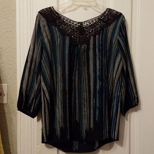 Blouse from Andrea's boutique.